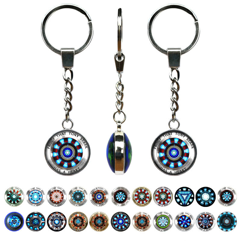 Set of Iron Man Arc Reactor keychains with various designs on a white background