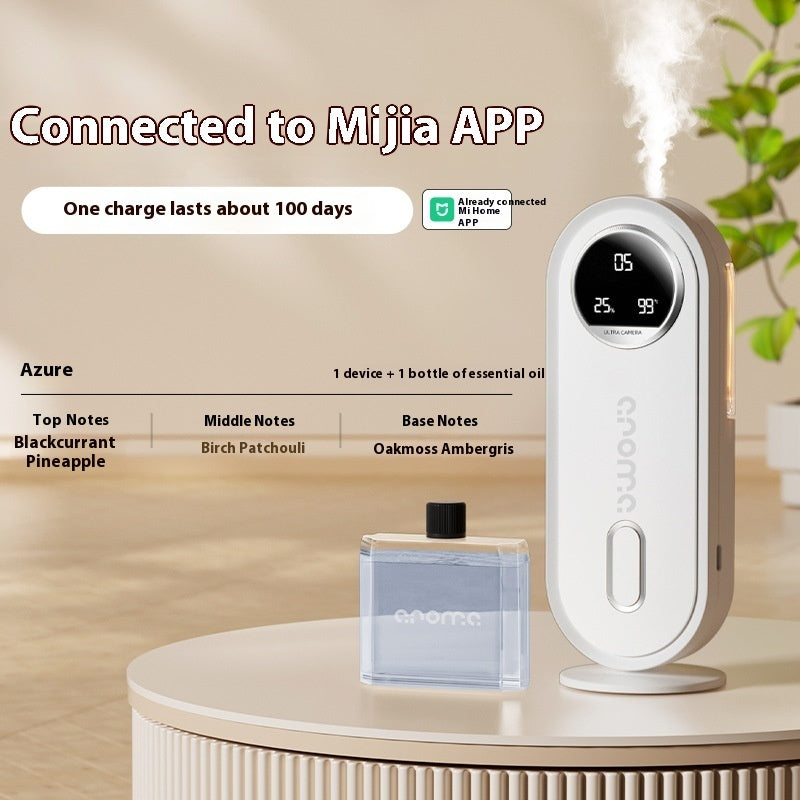 Mijia air diffuser with digital display on a wooden surface, connected to Mijia APP.