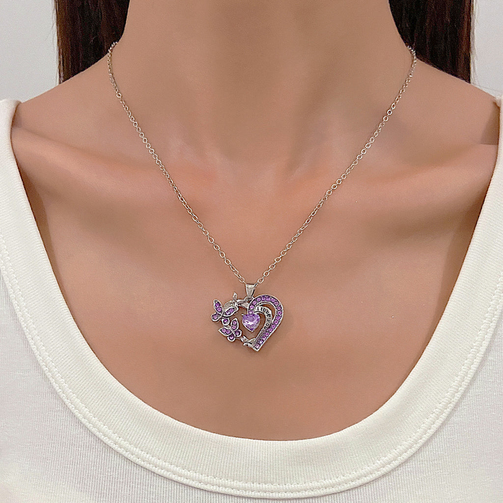 Necklace with a heart-shaped pendant on a mannequin