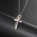 Necklace with a cross pendant on a dark background