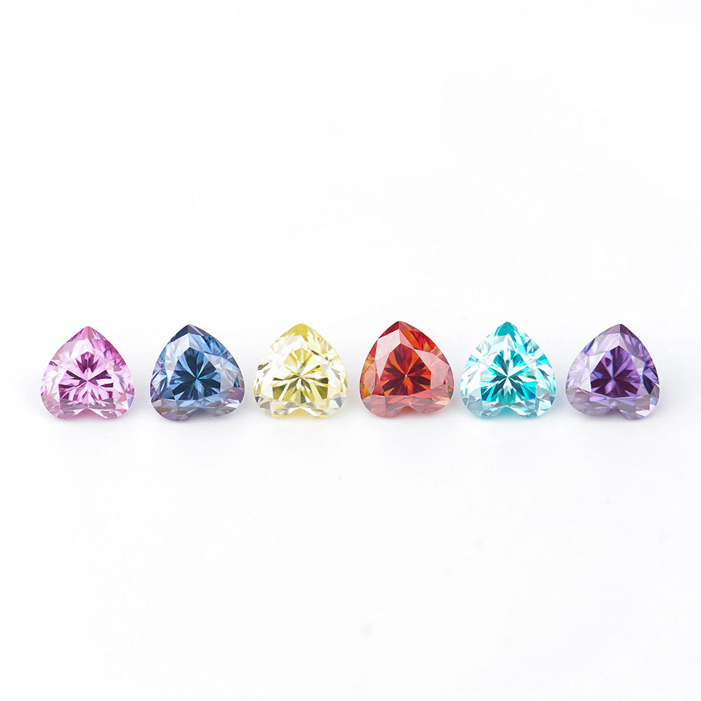 Set of six multicolored gemstones on a white background