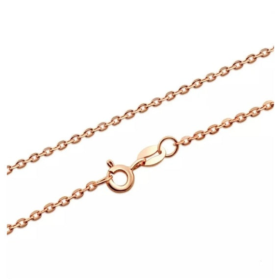 Rose gold chain necklace on a white background