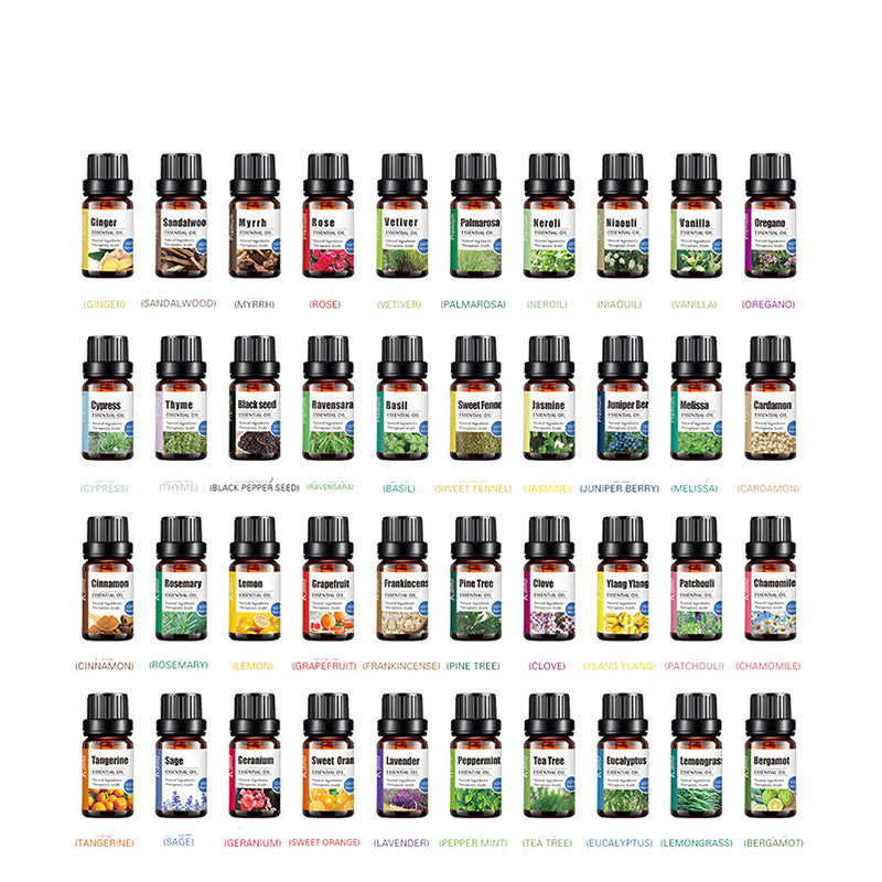Collection of various essential oil bottles with labels on a white background