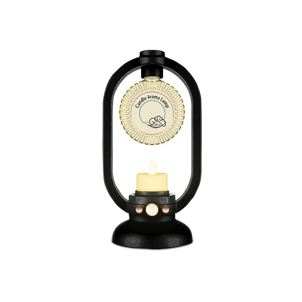 Black lantern-shaped candle holder with a lit candle inside on a white background
