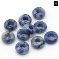 Blue stone beads on a white background
