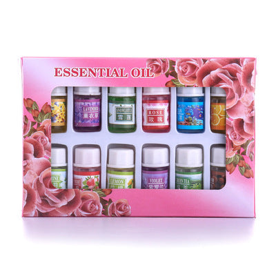 Set of 12 essential oils in a decorative box with floral design