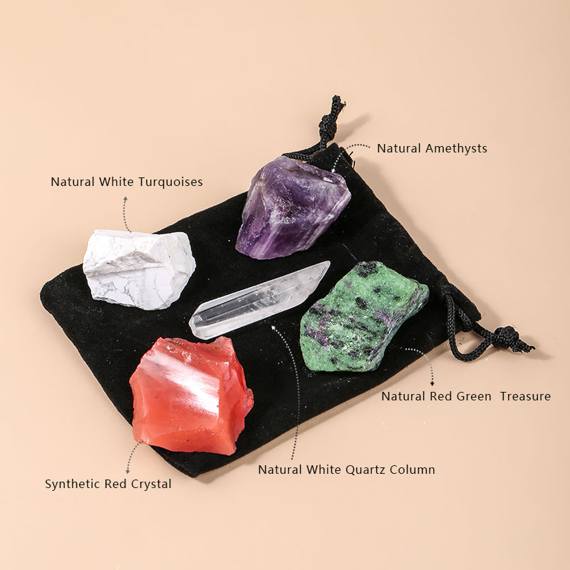 Collection of various crystals on a black cloth with labels on a beige background