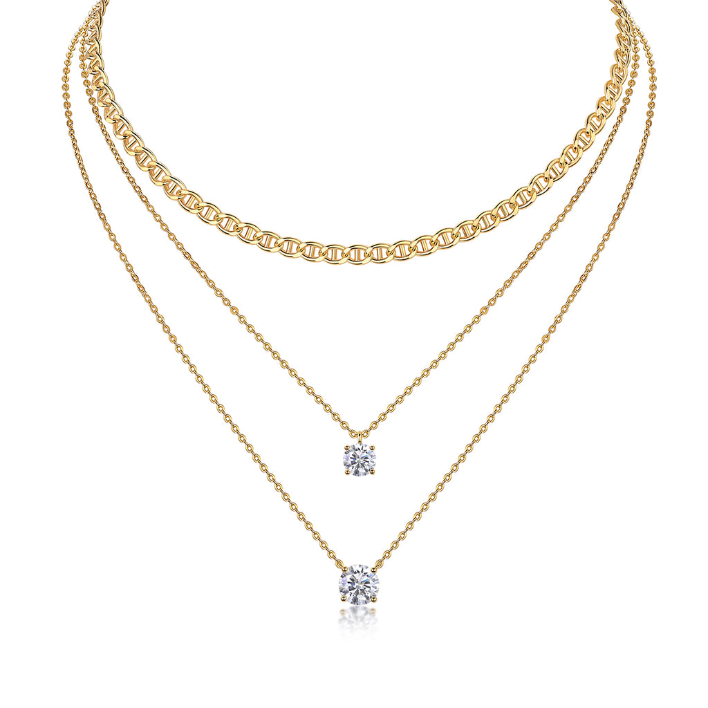 Two gold necklaces with diamond pendants on a white background