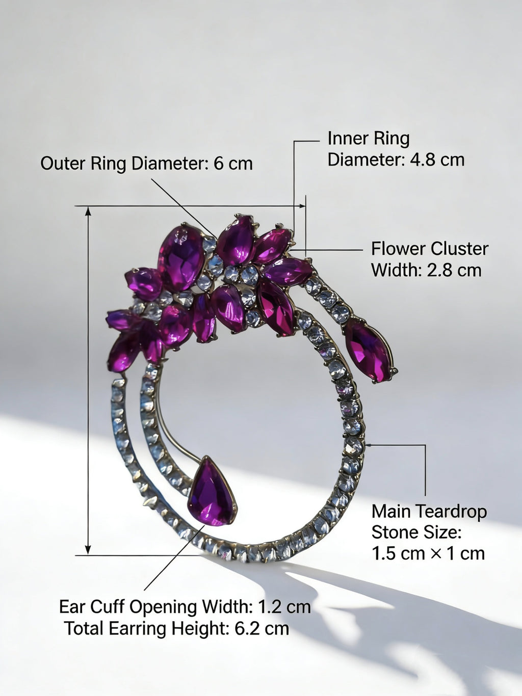 Earring with purple gemstones and measurements on a white background