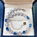 Silver bracelet with blue gemstones in a jewelry box