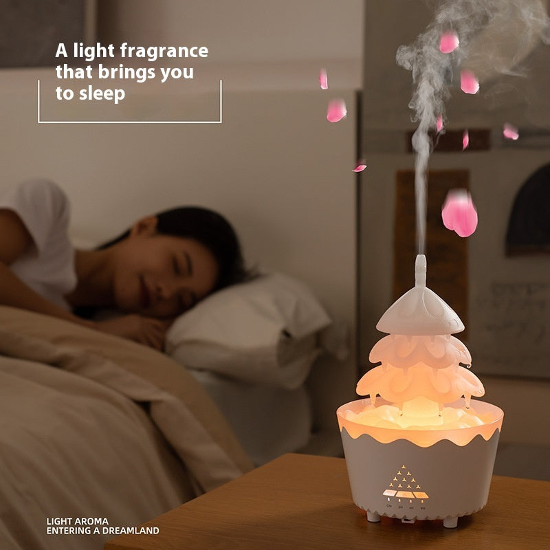 Woman sleeping in bed with a diffuser emitting steam and flowers, labeled 'A light fragrance that brings you to sleep'.