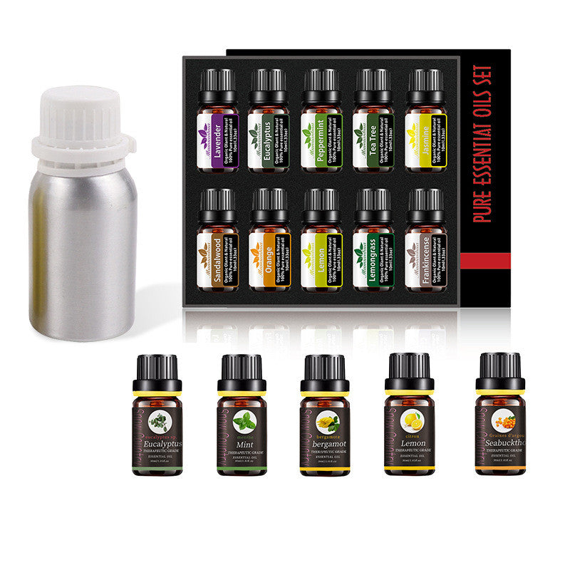 Collection of essential oil bottles with a box labeled 'Pure Essential Oils Set' on a white background.