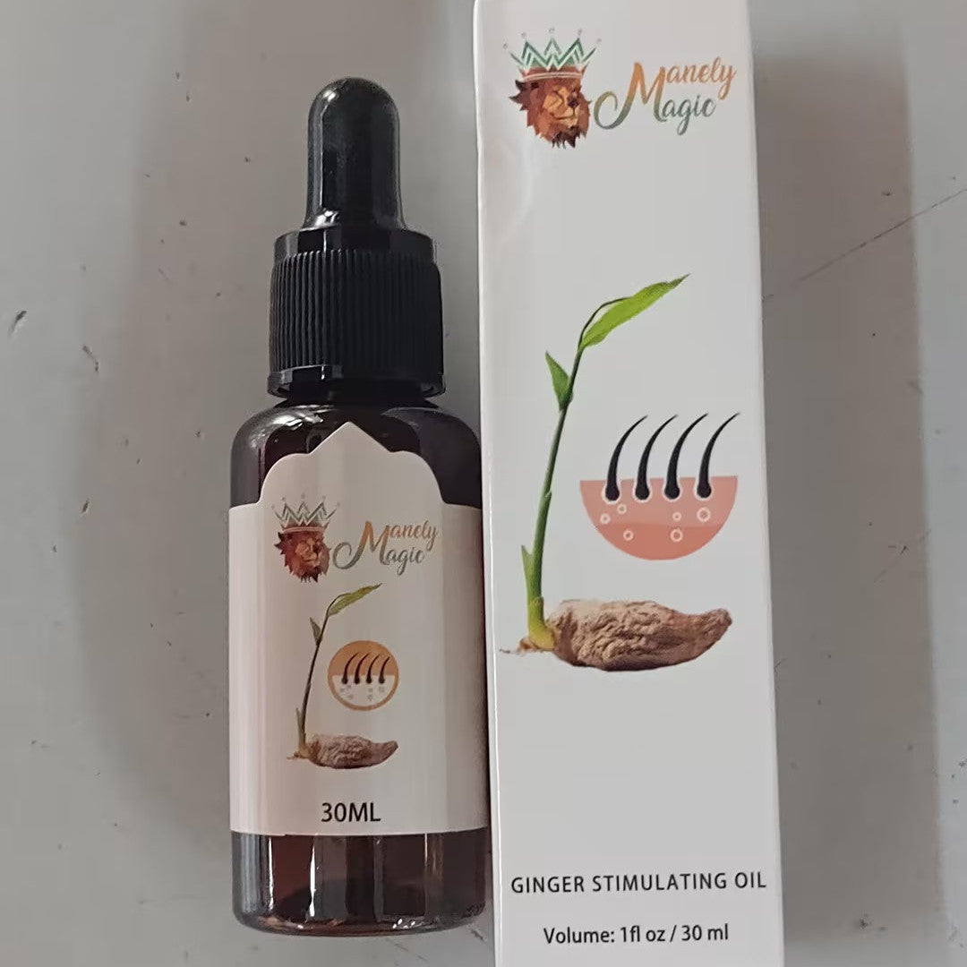 Bottle of Ginger Stimulating Oil with packaging on a white background