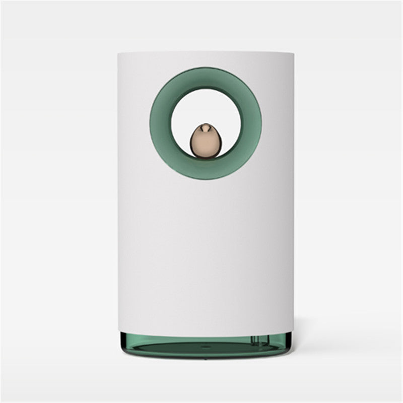 White cylindrical container with a green ring and small object inside on a white background