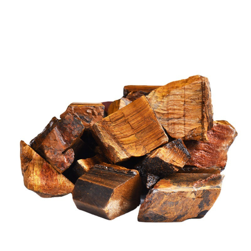 Stack of brown tiger eye stones on a white background