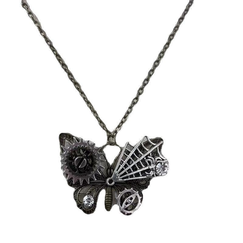 Butterfly-shaped pendant on a chain against a white background
