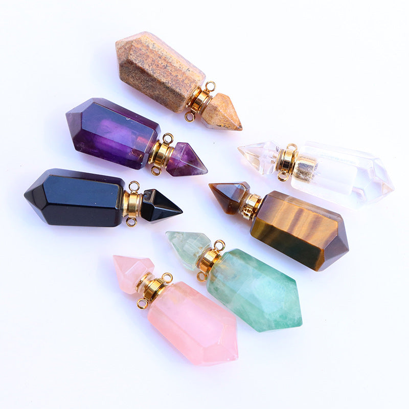 Collection of colorful crystal pendants on a white background