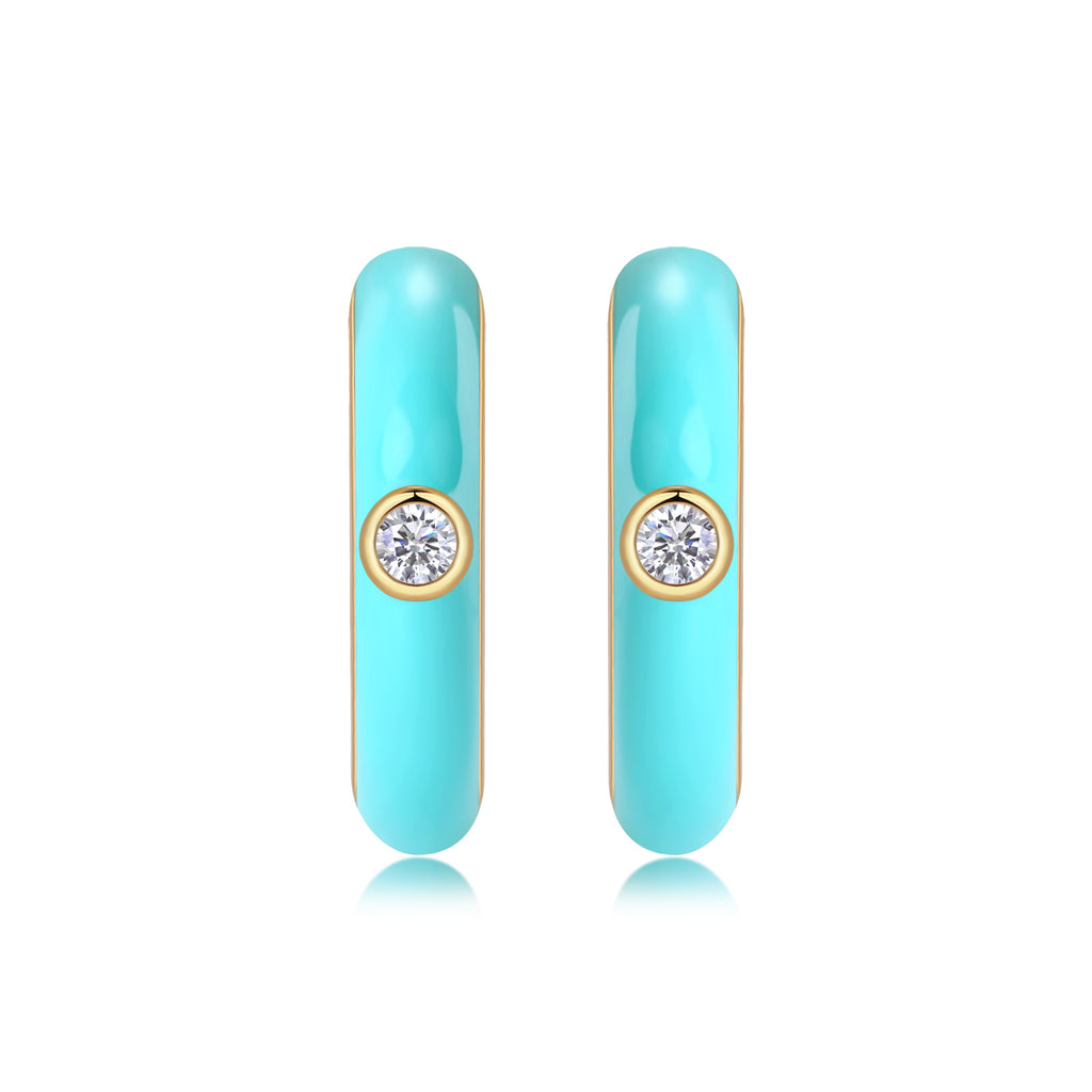 Turquoise hoop earrings with gold accents on a white background