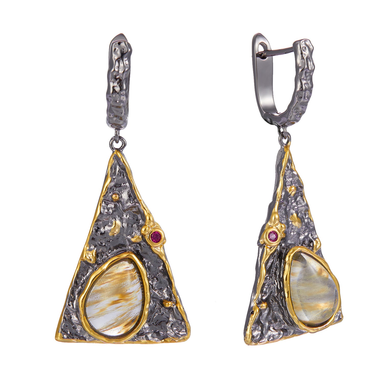 Pair of ornate earrings with triangular designs and gemstones on a white background