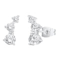Silver earrings with clear gemstones on a white background