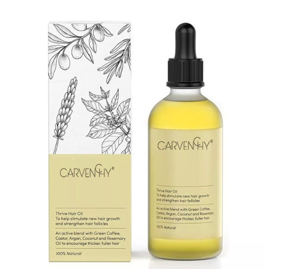 Carvenchy hair oil bottle and packaging on a white background
