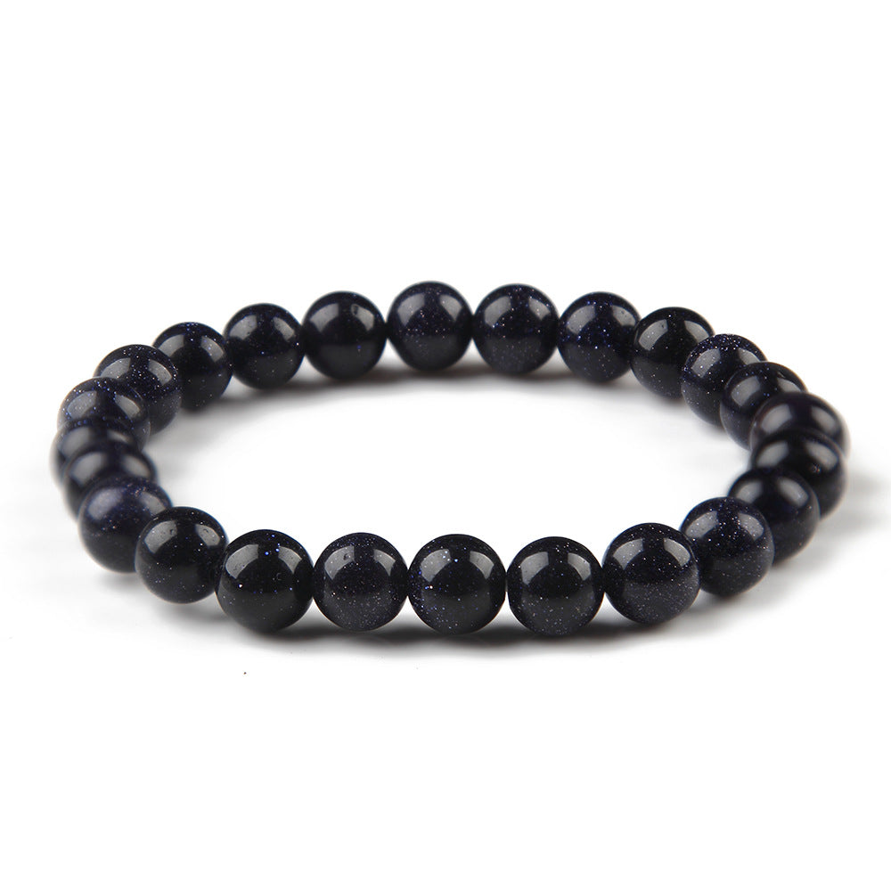 Black beaded bracelet on a white background
