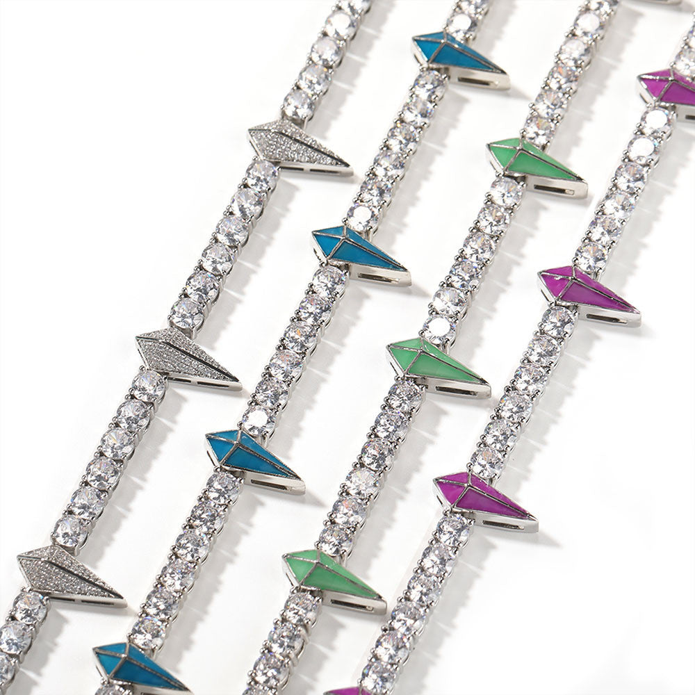 Bracelets with geometric designs and colored accents on a white background