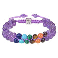 Multicolored beaded bracelet with a purple cord on a white background