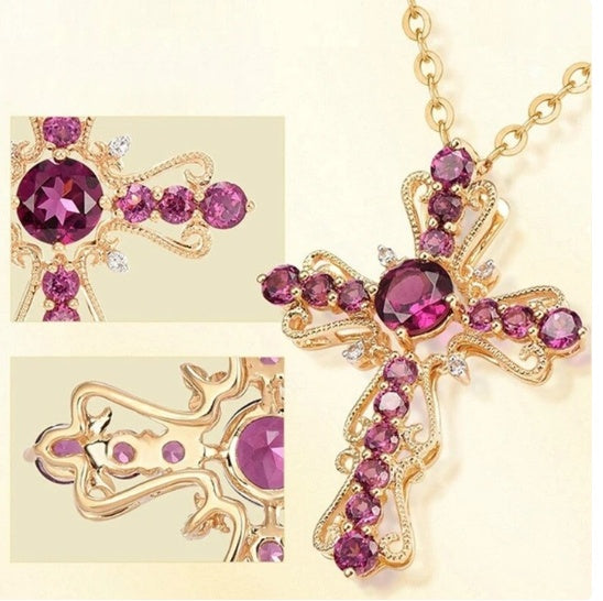 Gold cross necklace with purple gemstones on a light beige background