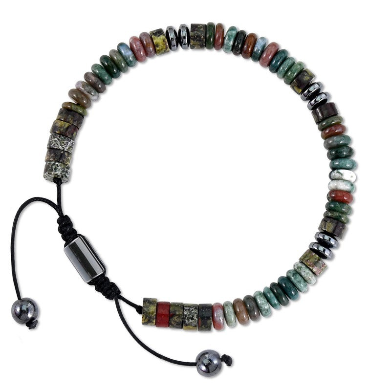 Multicolored beaded bracelet with a black cord on a white background