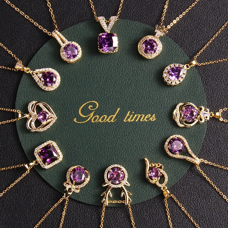 Gold necklaces with purple gemstones on a green round card with 'Good times' text.