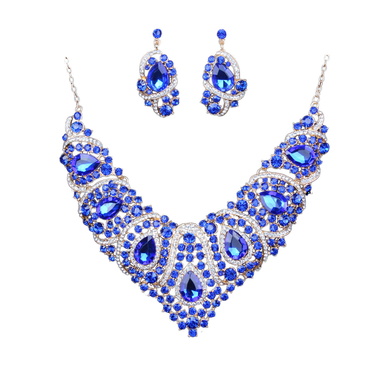 Jewelry set with blue gemstones on a white background