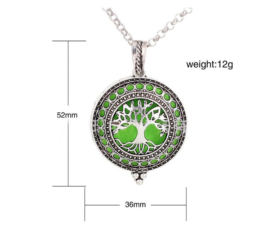 Green tree of life pendant necklace with measurements on a white background