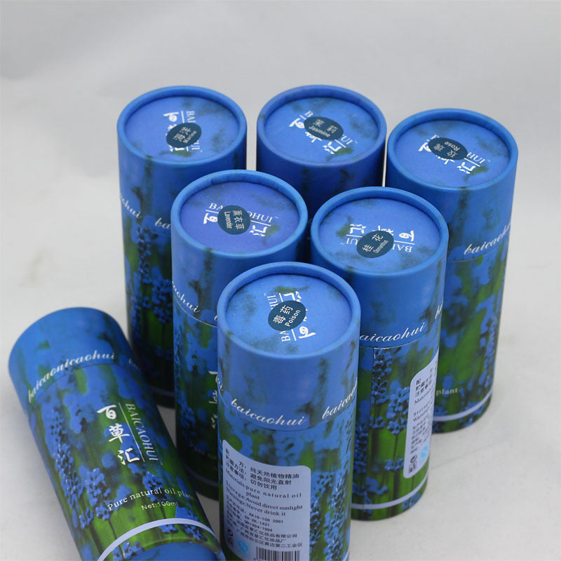 Set of blue cylindrical containers with branding on a light gray background