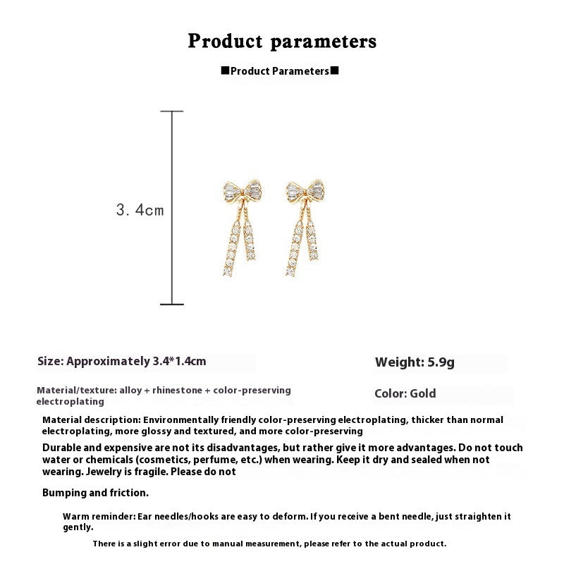 Gold earrings with product parameters on a white background