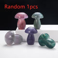 Colorful mushroom-shaped objects on a white surface with a black background