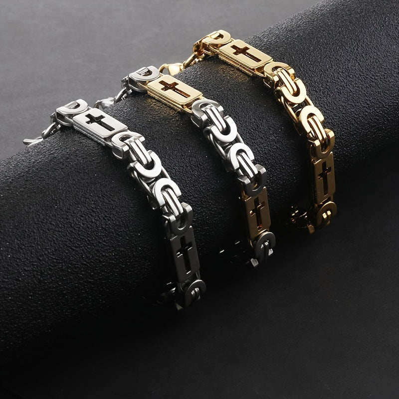 Three bracelets in gold, silver, and bronze on a dark surface