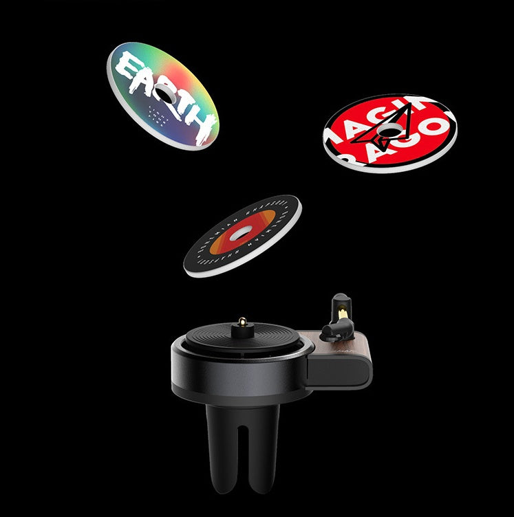 Black car air vent mount with three circular coasters labeled 'Earth', 'Aero', and 'Aero' on a black background.