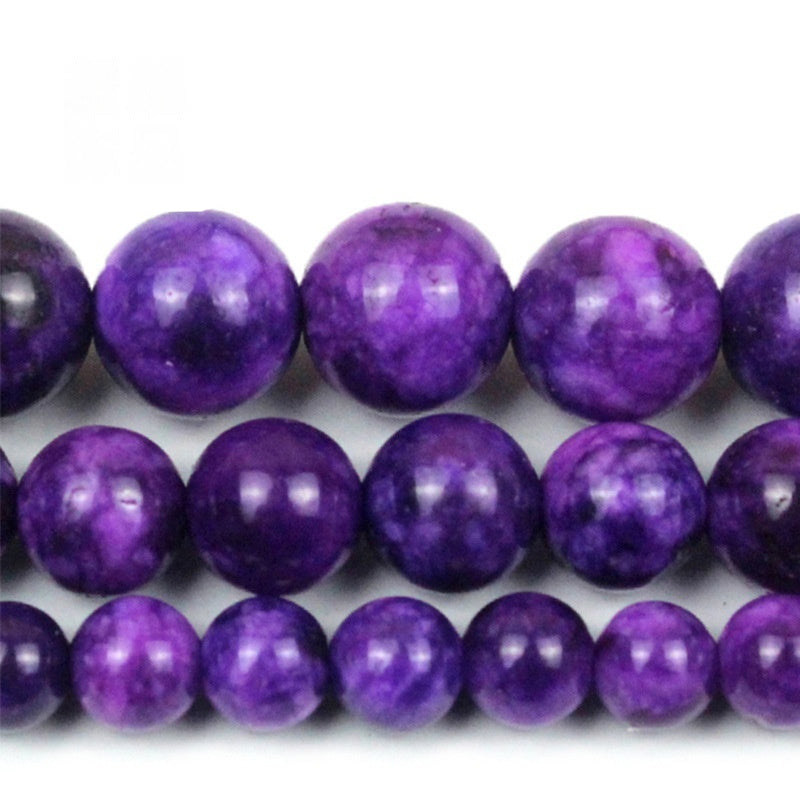 Purple beads on a white background