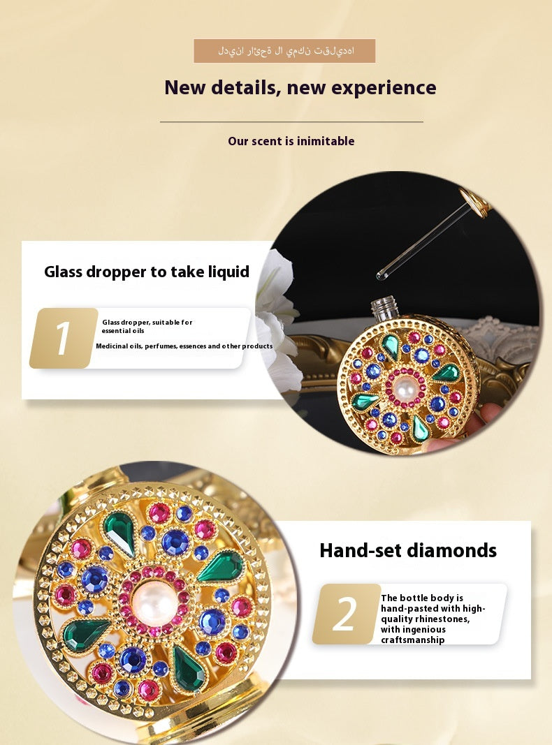 Decorative glass dropper with hand-set diamonds on a beige background