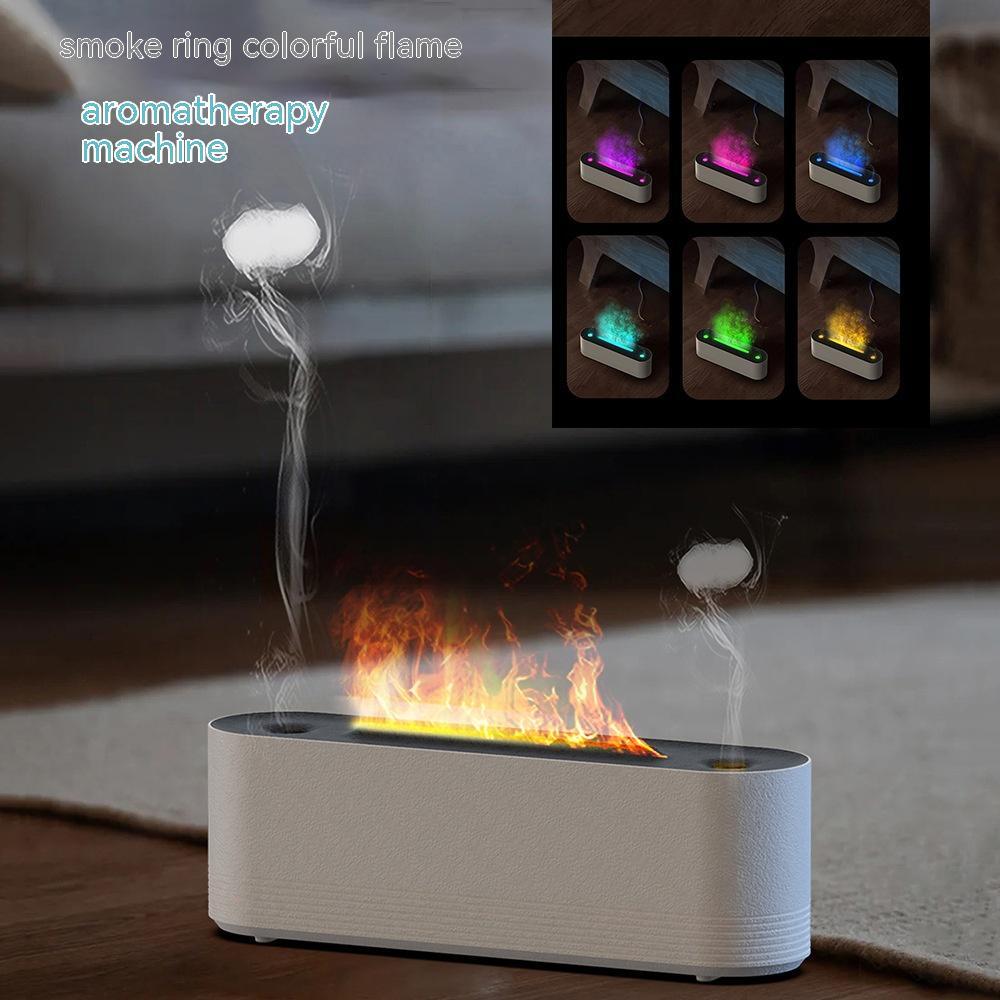 Aromatherapy machine with colorful flame effects on a wooden surface.