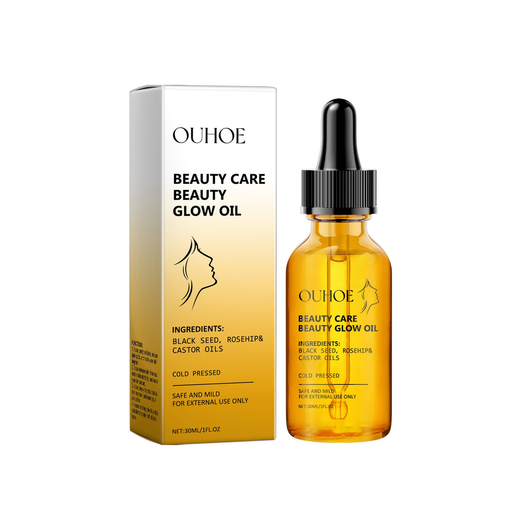 OUHOE Beauty Care Beauty Glow Oil bottle and packaging on a white background