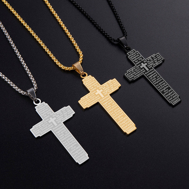 Three cross necklaces in gold, silver, and black on a dark background