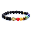Black beaded bracelet with colorful beads and a gold Buddha figure on a white background