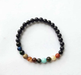 Multicolored beaded bracelet on a white background