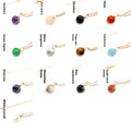 Collection of gemstone necklaces with labels on a white background