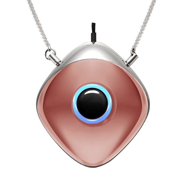 Necklace with a unique pendant featuring a black and blue center on a white background