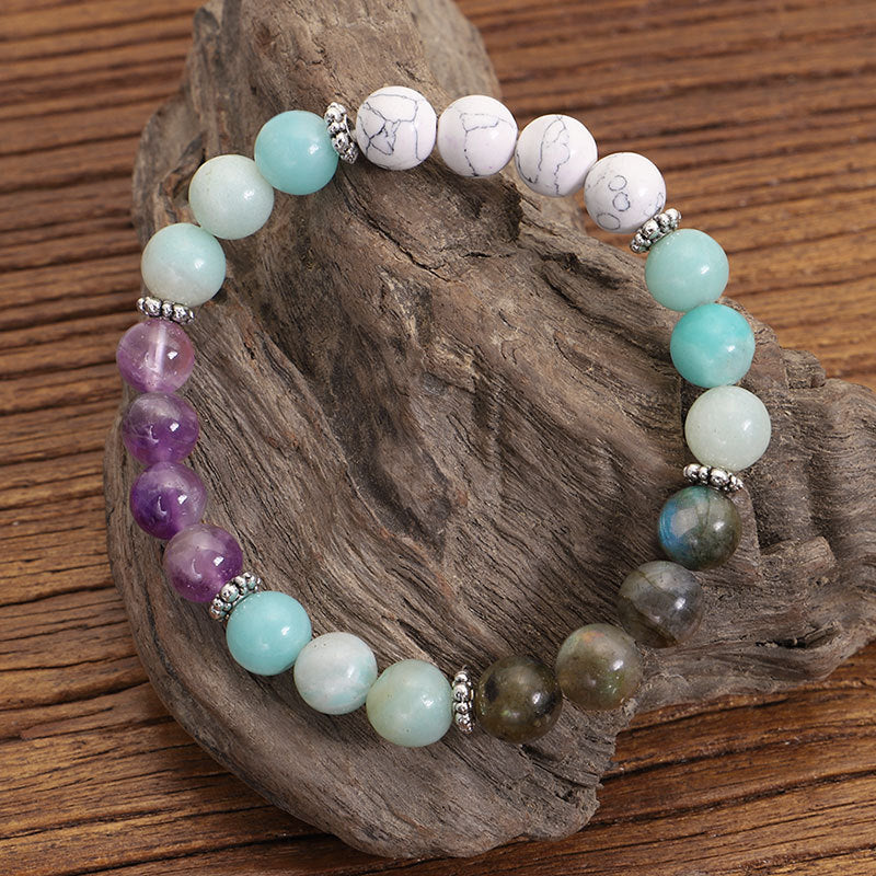 Multicolored beaded bracelet on a wooden surface