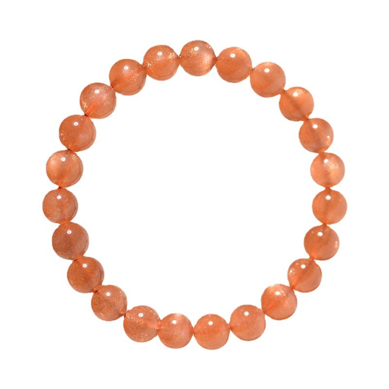 Orange beaded bracelet on a white background