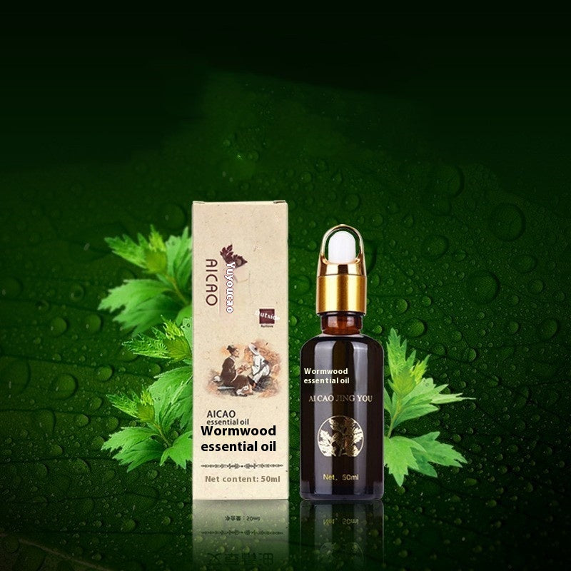 Aicao wormwood essential oil bottle and packaging on a green background with leaves.